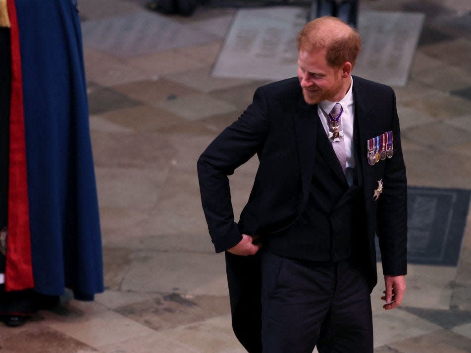 Prince Harry, Duke of Sussex arrives for the Coronation of King Charles III and Queen Camilla on May 6, 2023 in London, England. T