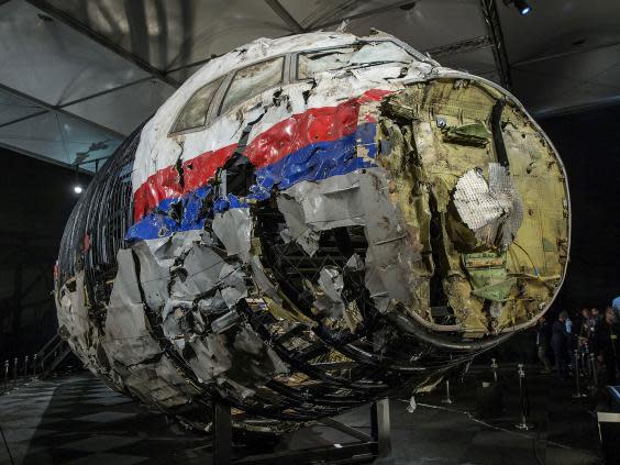 The reconstructed wreckage of Malaysia Airlines flight MH17 (Reuters)