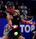 Tennis - Pan Pacific Open Women's Singles Semifinal match - Arena Tachikawa Tachihi, Tokyo, Japan - September 22, 2018. Naomi Osaka of Japan returns a ball to Camila Giorgi of Italy. REUTERS/Toru Hanai