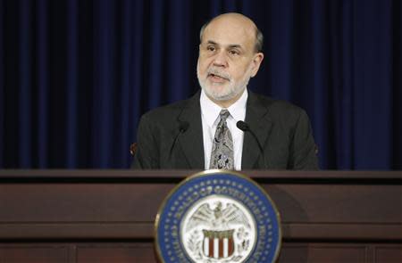 U.S. Federal Reserve Chairman Ben Bernanke delivers remarks at his final planned news conference before his retirement, at the Federal Reserve Bank headquarters in Washington, December 18, 2013. REUTERS/Jonathan Ernst