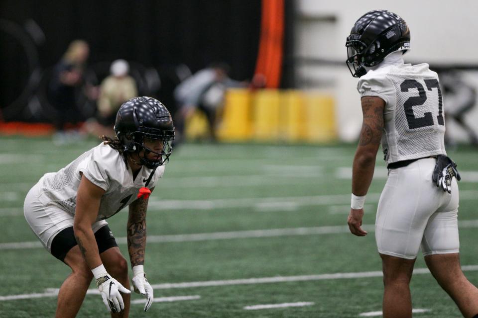 Purdue defensive back Reese Taylor (1) and Purdue cornerback Bryce Hampton (27) line up for a drill during a practice, Monday, Feb. 28, 2022 at Mollenkopf Athletic Center in West Lafayette.