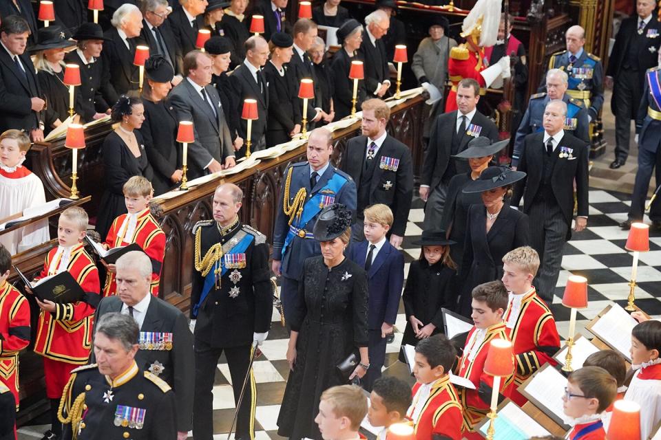 Members of the royal family (left to right, from front) the Duke of York, the Earl of Wessex, the Countess of Wessex, the Prince of Wales, Prince George, Princess Charlotte, the Princess of Wales, the Duke of Sussex, the Duchess of Sussex, Peter Phillips, the Earl of Snowdon, the Duke of Gloucester and the Duke of Kent attend the State Funeral of Queen Elizabeth II at Westminster Abbey on September 19, 2022 in London, England.