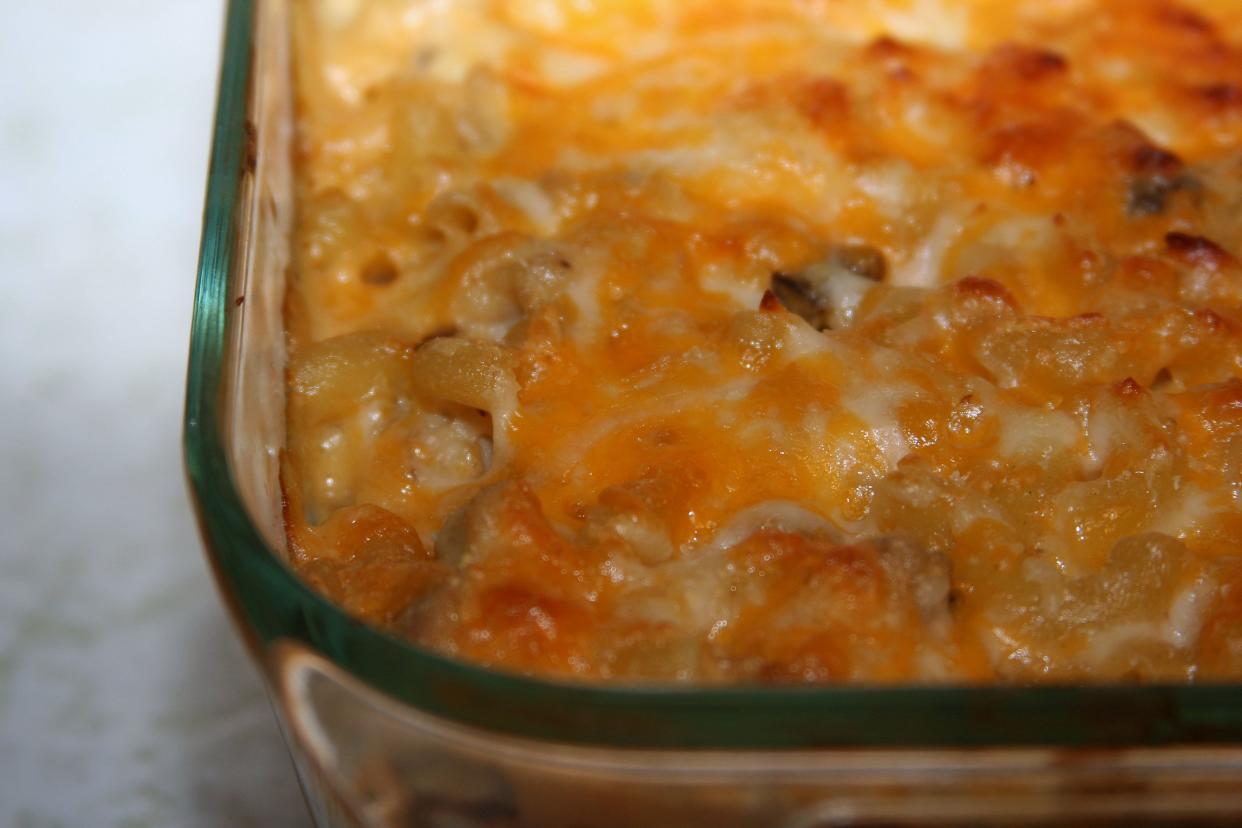 Cheesy chicken casserole in a glass baking dish