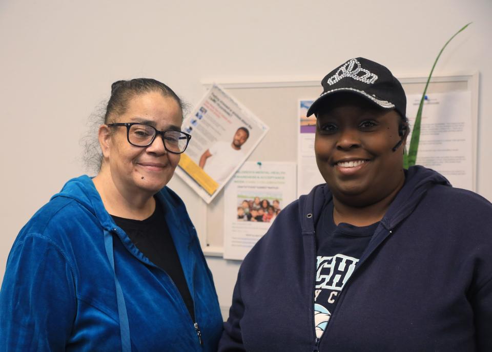 From left, Kasha Morgan, a family peer advocate at Mental Health America beside Annette Hubbard who received a Holiday Helping Hand gift card which helped with her holiday shopping while at the MHA office in the City of Poughkeepsie on December 15, 2022. 