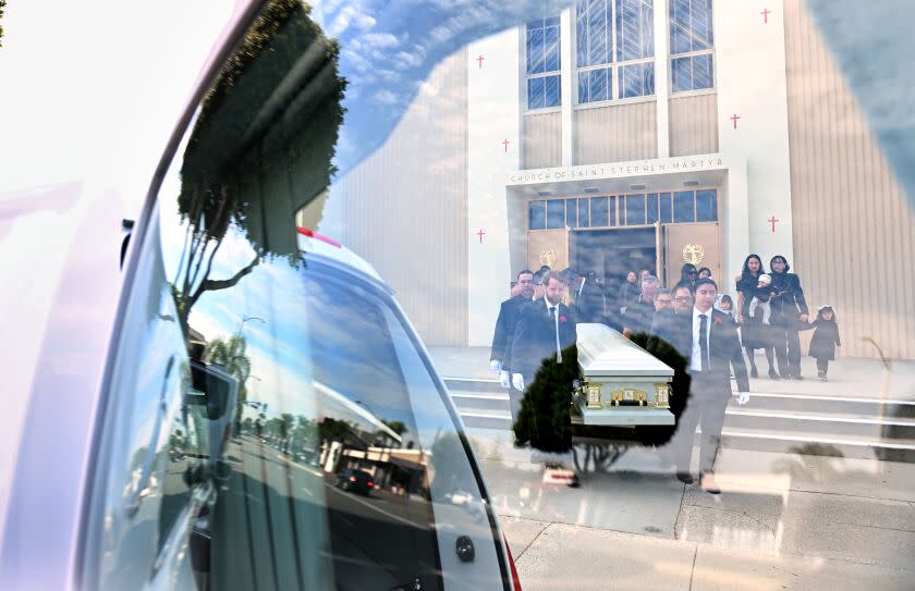 Monterey Park, California February 3, 2023-The casket of mass sooting victim Valentino Marcos- Alvero leaves Saint Stephen Martyr Catholic Church as mourners gather in Monterey Park Friday. (Wally Skalij/Los Angeles Times)