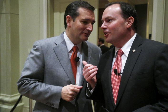 Sen. Ted Cruz, R-Texas, left, has a word with Sen. Mike Lee, R-Utah, after Cruz spoke at the Susan B. Anthony List &quot;Campaign for Life Gala and Summit&quot;, a gathering of anti-abortion advocates, in Washington, Wednesday, March 12, 2014. (Charles Dharapak/AP Photo)