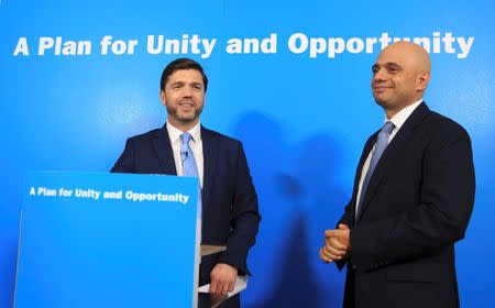 Britain's Work and Pensions Secretary, Stephen Crabb (L), speaks watched by Business Secretary, Sajid Javid, at a news conference in London, Britain June 29, 2016. REUTERS/Paul Hackett