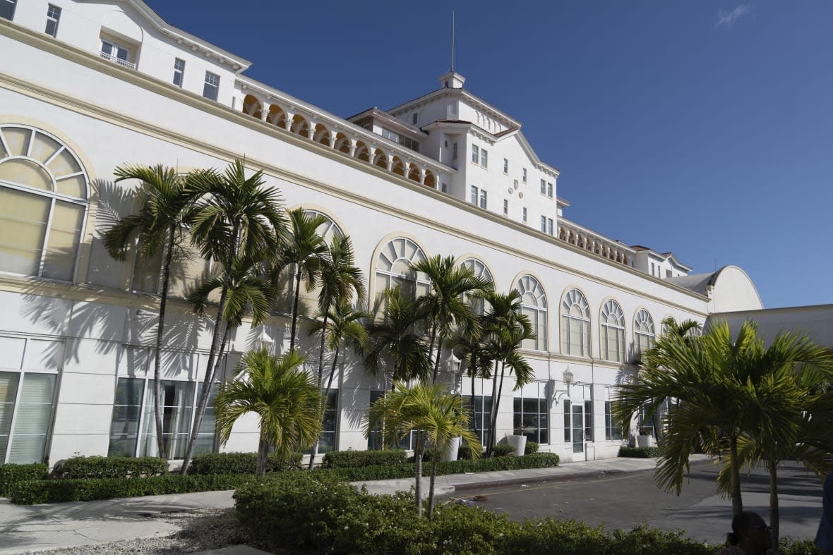 The British Colonial hotel in Nassau, Bahamas, best known for being the site of the James Bond movie “Never Say Never Again,” is shown on Wednesday, Dec. 7, 2022. The hotel was boarded up after the Bahamian government closed the country off from tourists during the pandemic. (AP Photo/Ken Sweet)