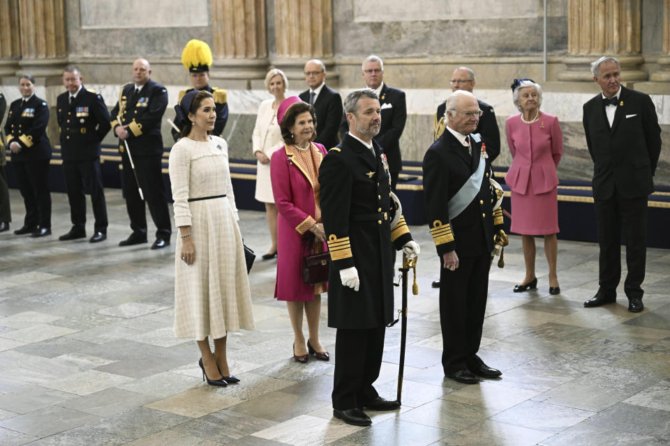 Denmark's King Frederik X, foreground, stands by Sweden's King Carl XVI Gustaf, with Denmark's Queen Mary and Sweden's Queen Silvia, in the Hall of State at the Royal Palace in Stockholm, Sweden, Monday, May 6, 2024. Denmark’s King Frederik X has arrived in Stockholm, accompanied by his Australian-born wife Queen Mary, as he embarked on his first official visit abroad as new Danish monarch. (Fredrik Sandberg//TT News Agency via AP)