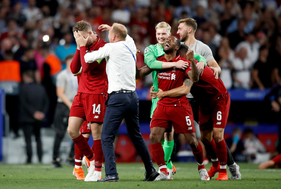 Liverpool's Jordan Henderson celebrates victory after winning the UEFA Champions League Final at the Wanda Metropolitano, Madrid.