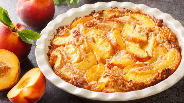 Peach cobbler in white dish