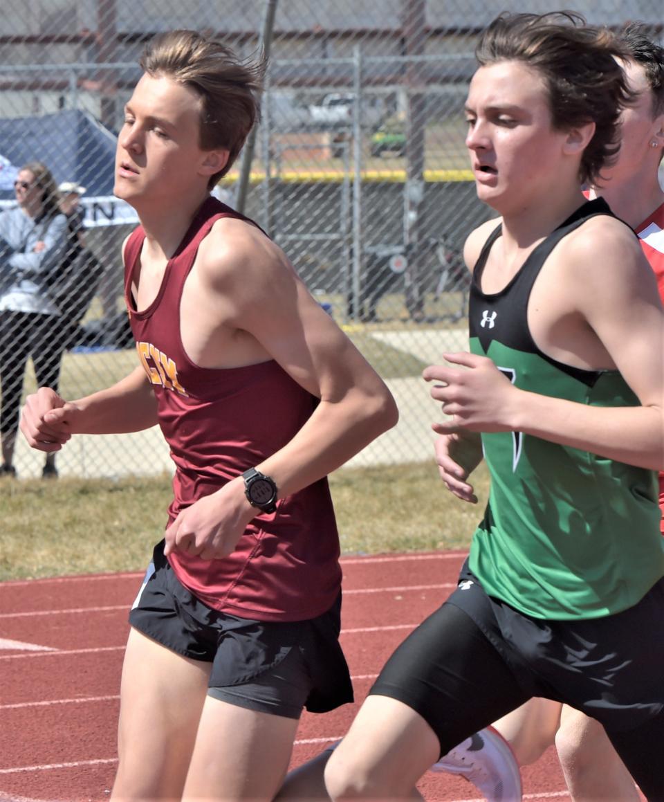 Rocky Mountain High School's Walter Hansen and Fossil Ridge's Carter Brazelton set the pace early in their heat of the boys 1,600 meters at the Runners Roost Invitational on Saturday, March 26, 2022, at French Field in Fort Collins, Colo. Hansen won the heat.