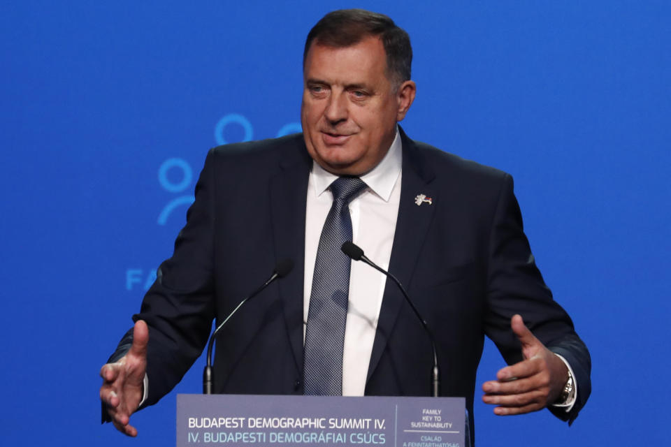 Bosnian Serb member of the tripartite Presidency of Bosnia Milorad Dodik holds a speech during the 4th Budapest Demographic Summit in Budapest, Hungary, Thursday, Sept. 23, 2021. The biannual demographic summit, which was first organized in 2015, offers a forum for "pro-family thinker" decision-makers, scientists, researchers, and church representatives of the same sort to exchange their thoughts about connections between demographics and sustainability. (AP Photo/Laszlo Balogh)