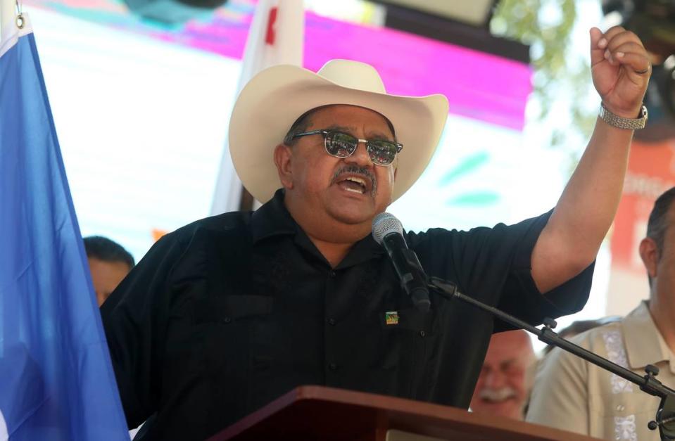 Madera Mayor Santos García holds the flag of Nicaragua during the Fiestas Patrias celebration in downtown Fresno on Sept. 24, 2023.