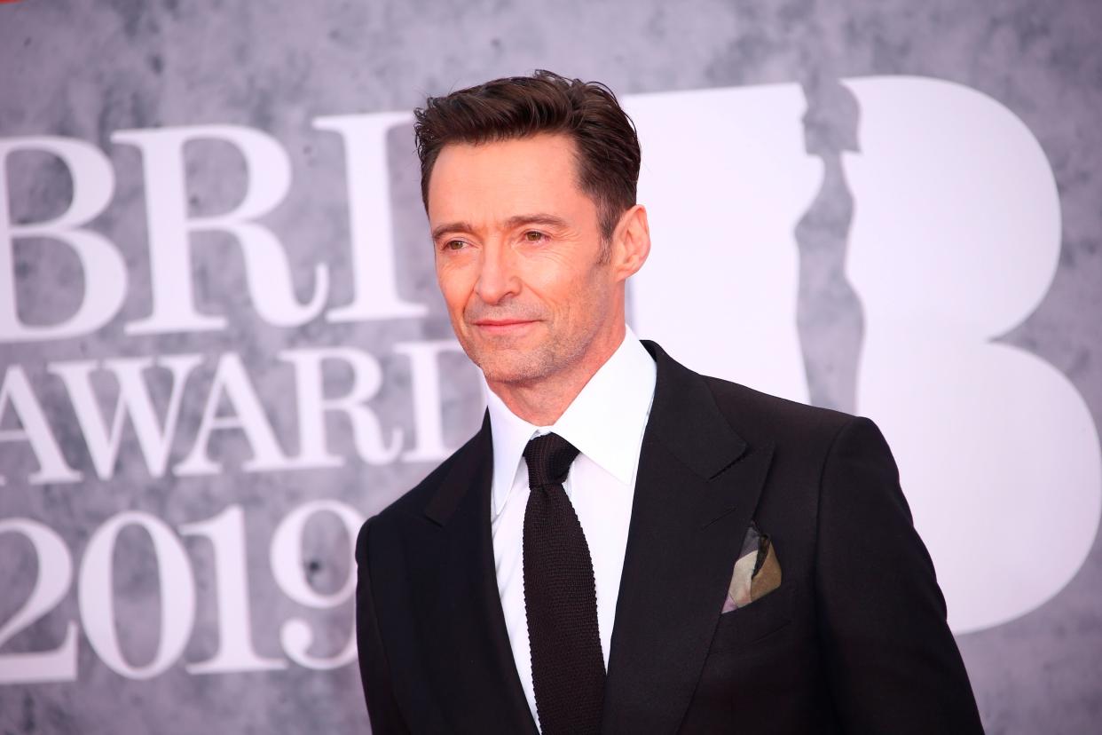Hugh Jackman poses for photographers upon arrival at the Brit Awards in London, Wednesday, Feb. 20, 2019. (Photo by Joel C Ryan/Invision/AP)