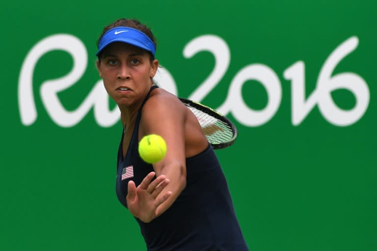 USA's Madison Keys returns the ball to France's Kristina Mladenovic during their women's second round singles tennis match of the Rio Olympic Games on August 8, 2016