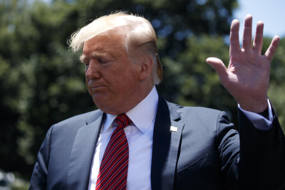 President Donald Trump walks away after speaking to reporters before departing for a trip to Iowa, on the South Lawn of White House, Tuesday, June 11, 2019, in Washington. (AP Photo/Evan Vucci)