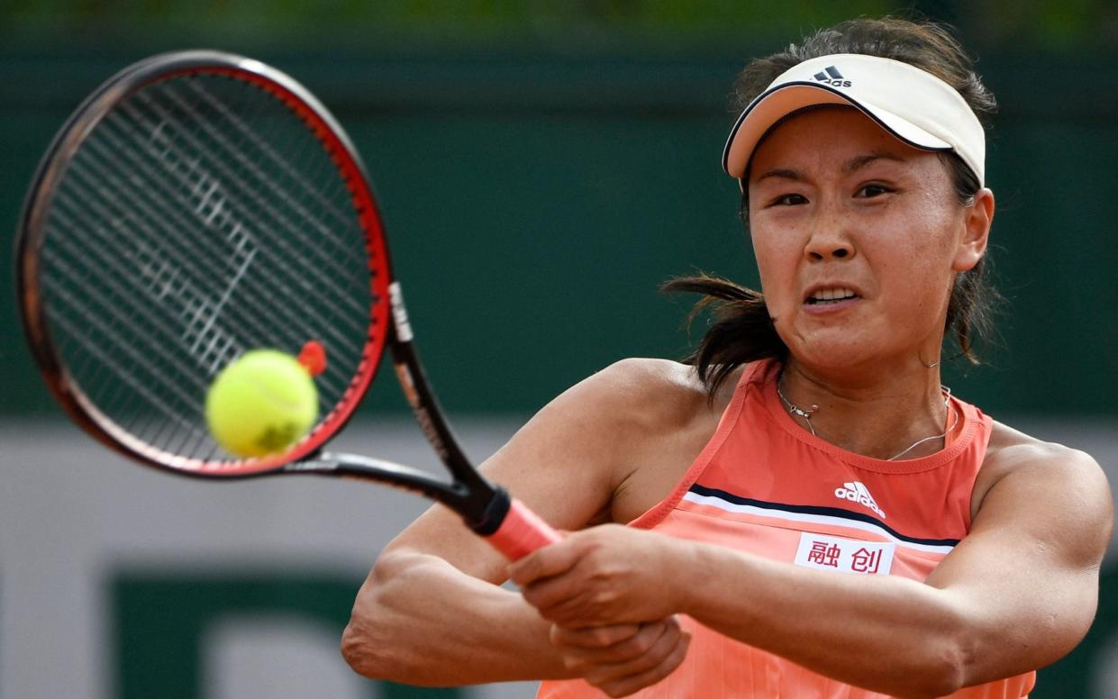 China's Peng Shuai hits a return against Serbia's Aleksandra Krunic during their women's singles first round match on day three of The Roland Garros 2018 French Open tennis tournament in Paris - afp/afp