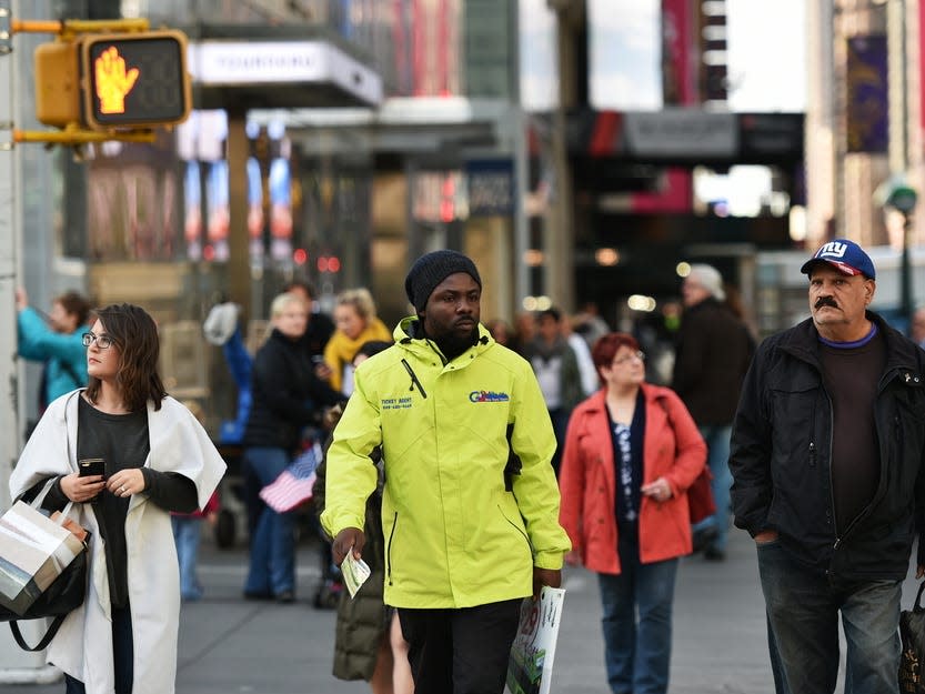 People walking on the street in New York City.