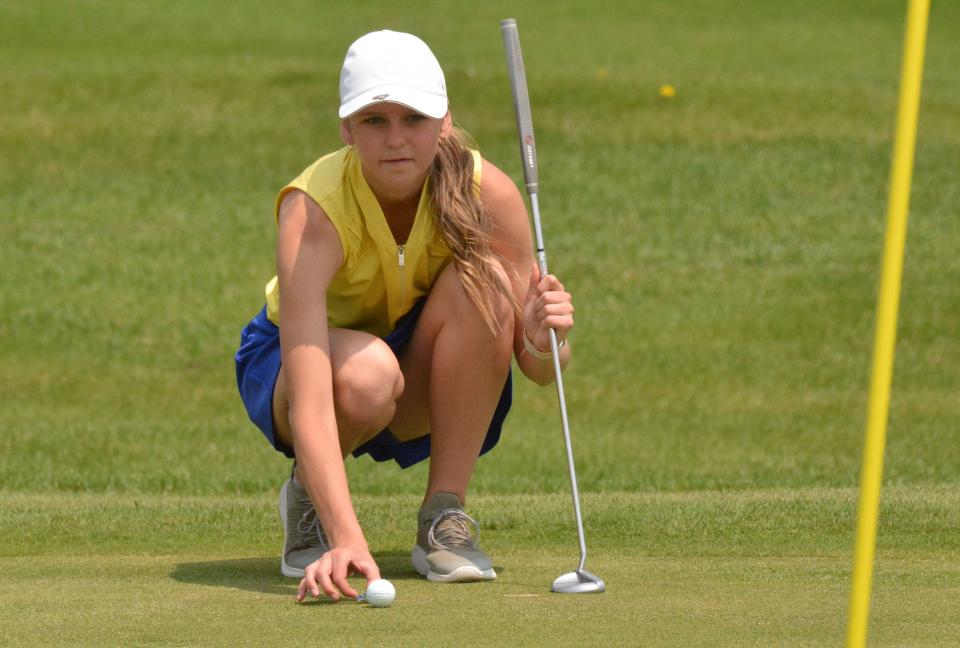 Aberdeen Central's Emma Dohrer lines up a putt on No. 5 Red during the Watertown Girls Golf Invitational on Tuesday, May 16, 2023 at Cattail Crossing Golf Course.