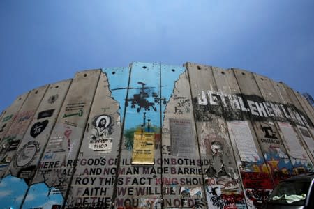 View shows a sections of the Israeli barrier painted with graffiti and murals in Bethlehem, in the Israeli-occupied West Bank