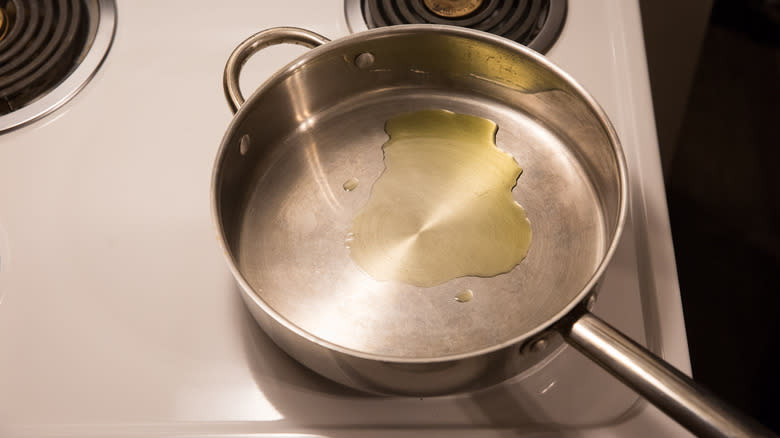 oil in stainless steel saute pan