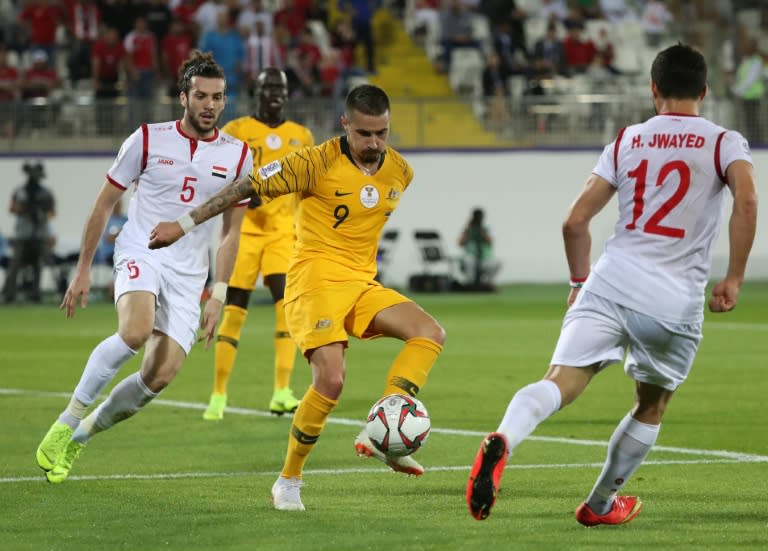 Australia's Jamie Maclaren (C) scored his first international goal at the Asian Cup