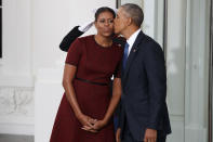 <p>President Barack Obama kisses first lady Michelle Obama as they wait for President-elect Donald Trump and his wife Melania Trump at the White House, Friday, Jan. 20, 2017, in Washington. (Photo: Evan Vucci/AP) </p>