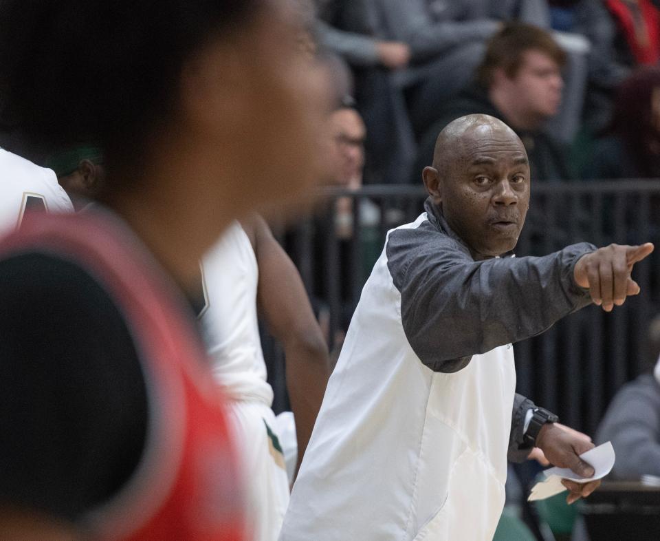 GlenOak head coach Rick Hairston directs his team during a boys high school basketball game against McKinley at GlenOak on Thursday, December 14, 2023.