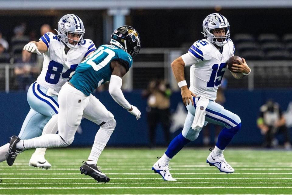Dallas Cowboys quarterback Will Grier (15) runs the ball second quarter during the first preseason game between the Dallas Cowboys and Jacksonville Jaguars at AT&T Stadium in Arlington, Texas on Saturday, Aug. 12, 2023. Chris Torres/ctorres@star-telegram.com