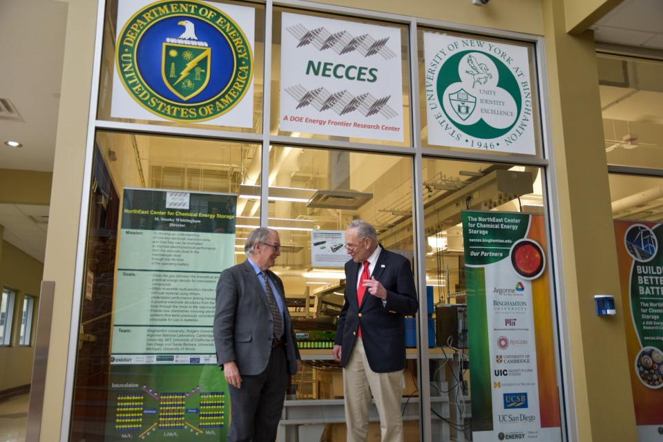 Dr. Stanley Whittingham, left, speaks with Senate Majority Leader Chuck Schumer during an event at the M. Stanley Whittingham Laboratory at Binghamton University. Schumer has invited Whittingham to attend the State of the Union Tuesday night to highlight Binghamton's role in the growing battery economy.