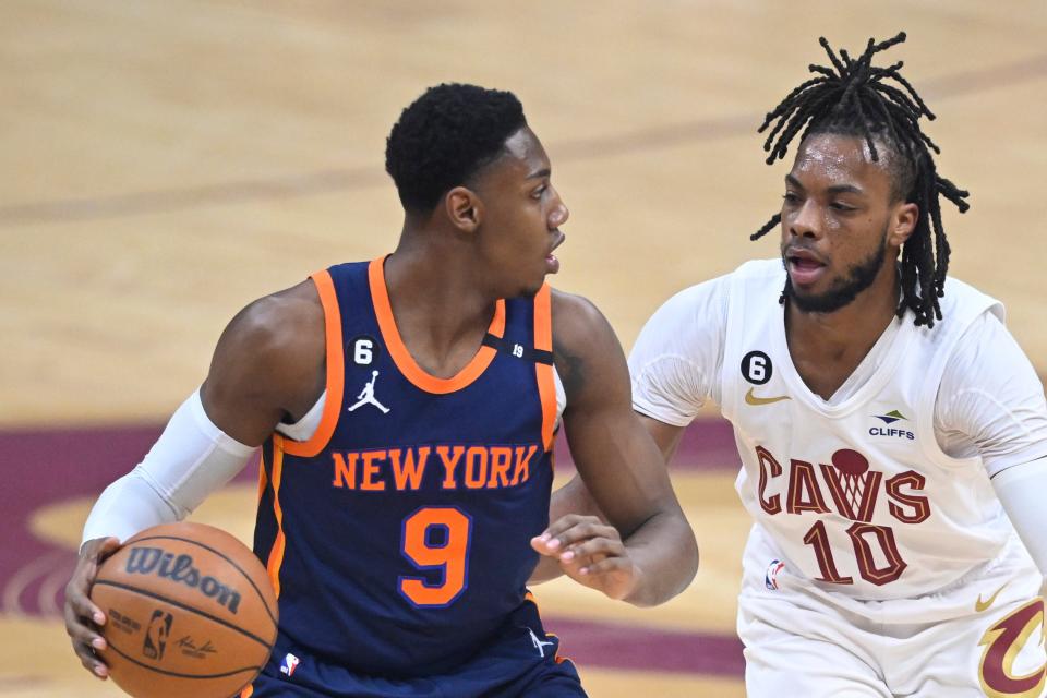 Apr 26, 2023; Cleveland, Ohio, USA; Cleveland Cavaliers guard Darius Garland (10) defends New York Knicks guard RJ Barrett (9) in the first quarter during game five of the 2023 NBA playoffs at Rocket Mortgage FieldHouse. Mandatory Credit: David Richard-USA TODAY Sports