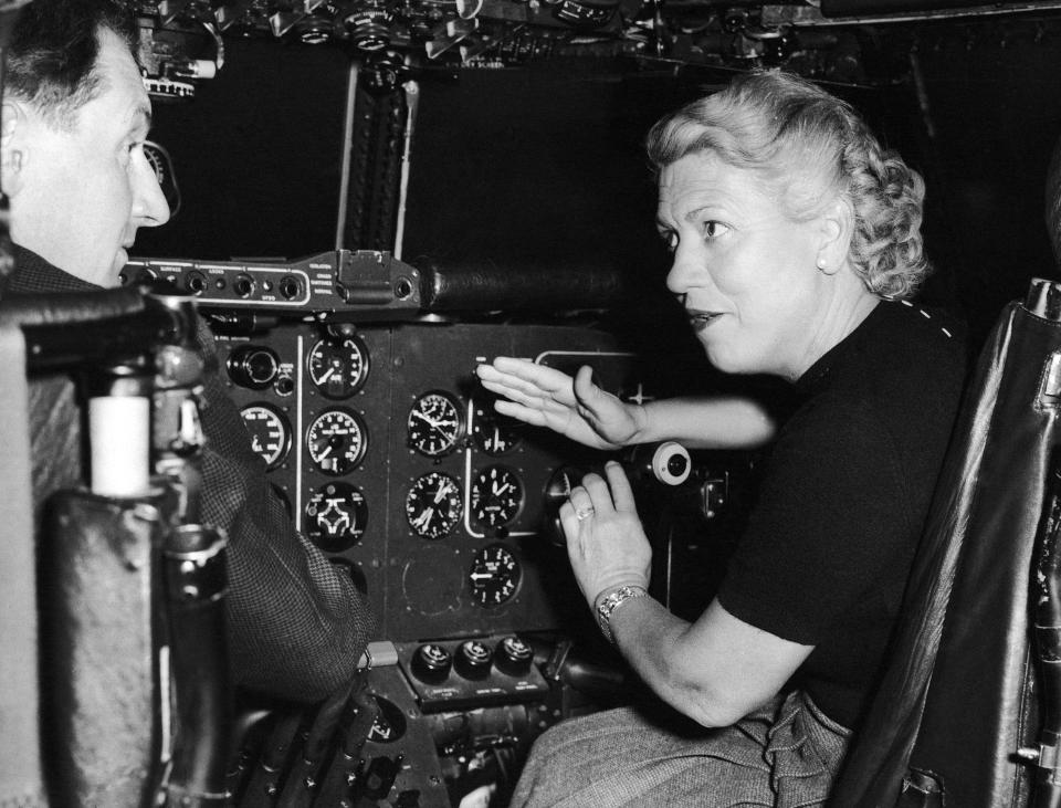 Jacqueline Cochran, the famous American pilot and Director of Northeast Airlines, USA, in the cockpit before she flew a Bristol Britannia Turbo-prop plane from London to Paris on Nov 28, 1956. She then ordered five of them and booked an option on two more. At the time she was only woman airline director in the world.