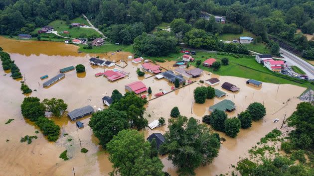 Aerial view of homes submerged under flood waters from the North Fork of the Kentucky River in Jackson, Kentucky, on July 28. (Photo: LEANDRO LOZADA/AFP/Getty Images)