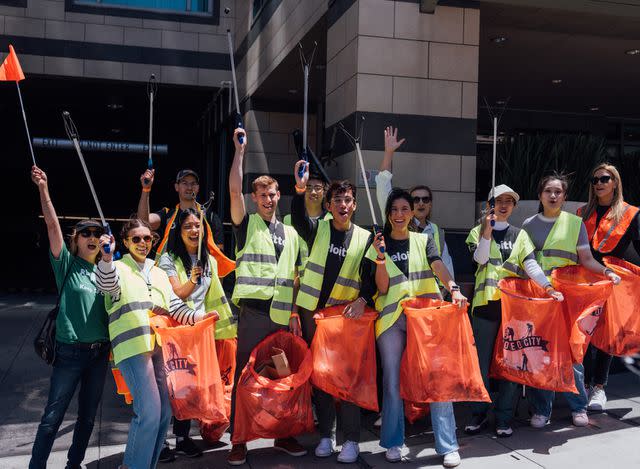 <p>Deloitte</p> Deloitte professionals mark Impact Day, their annual day of service, on June 7 in San Francisco.