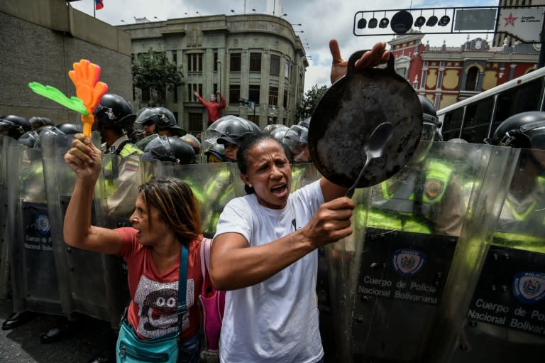 People cities and municipalities in opposition to Venezuelan President Nicolas Maduro gather at the vice-presidency to demand more resources from the government, in Caracas, on September 29, 2016
