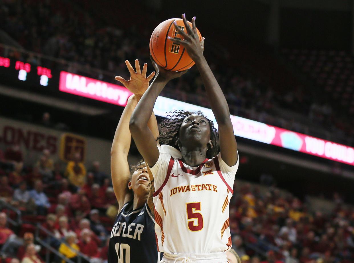 Iowa State's Nyamer Diew takes a shot in front of Butler's Rachel Kent (10) during the fourth quarter of Monday's season-opening game at Hilton Coliseum in Ames. Diew led the Cyclones with 19 points.
