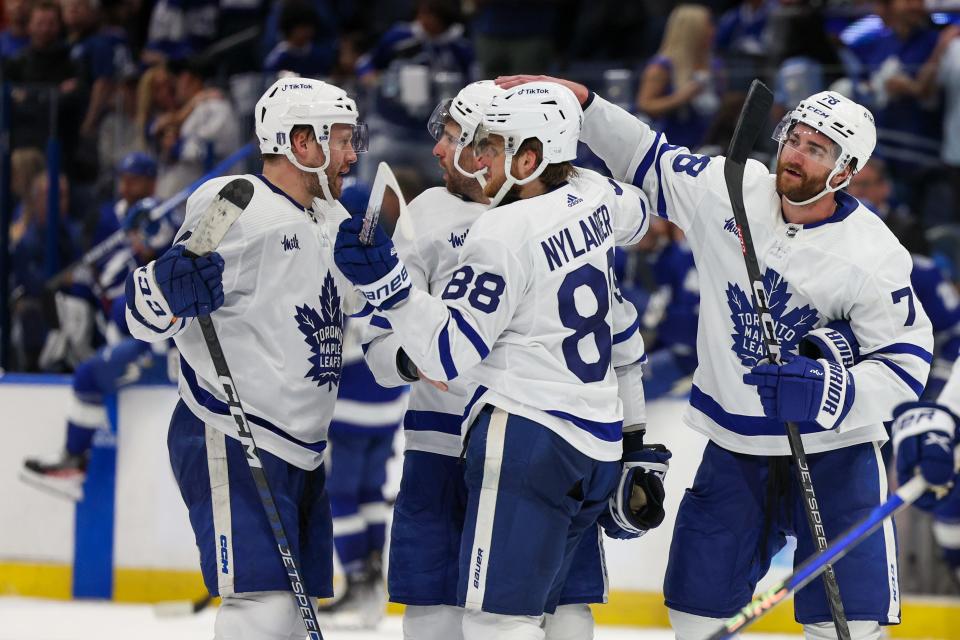 The Toronto Maple Leafs celebrate after beating the Tampa Bay Lightning in overtime of Game 6 of their first-round series.