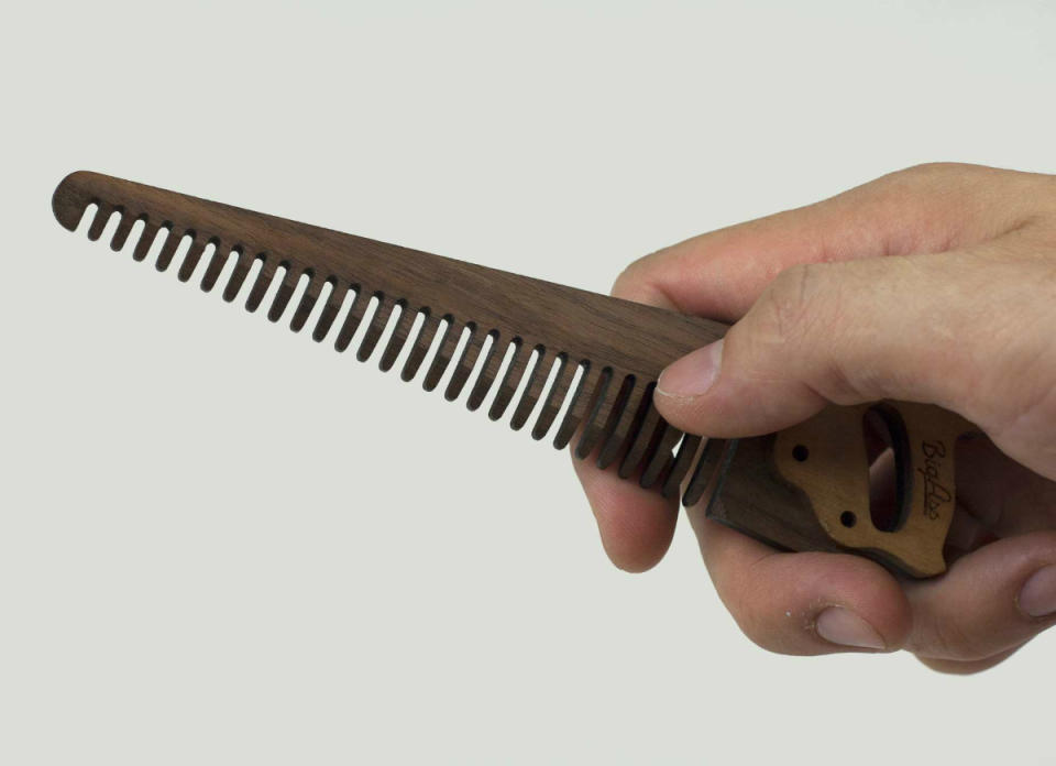 <body><p>No one can maintain a luxurious beard without a little TLC and grooming with a fine-toothed comb like this one. The hand-polished walnut finish and cherry wood grip offer comfort, while the rugged saw shape emulates the <a rel="nofollow noopener" href=" http://www.bobvila.com/slideshow/bob-vila-s-7-essential-woodworking-tools-46645?bv=yahoo" target="_blank" data-ylk="slk:tools of a lumberjack’s trade;elm:context_link;itc:0;sec:content-canvas" class="link ">tools of a lumberjack’s trade</a>. <em>Available at <a rel="nofollow noopener" href=" http://bigassgoods.com/products/saw-comb" target="_blank" data-ylk="slk:Big Ass Goods;elm:context_link;itc:0;sec:content-canvas" class="link ">Big Ass Goods</a>; $30.</em> </p></body>