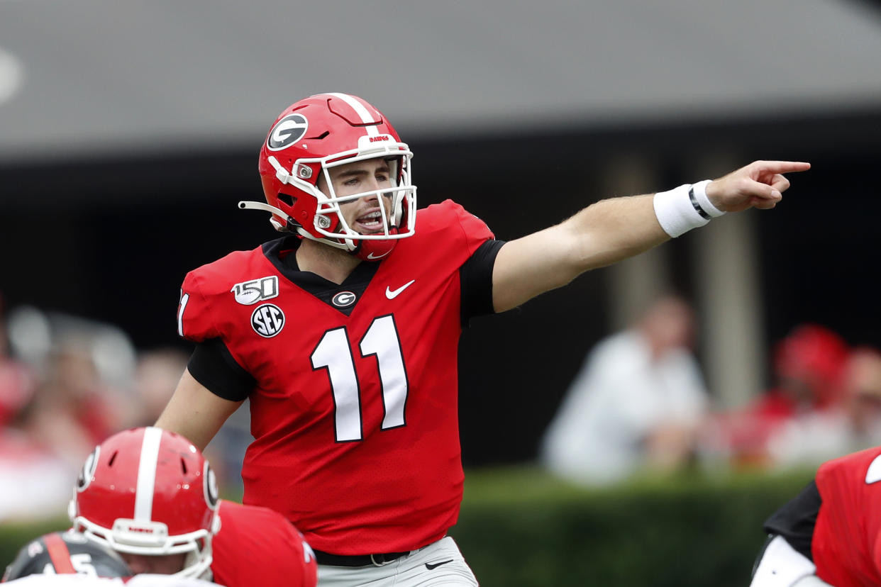 FILE - In this Sept. 14, 2019, file photo, Georgia quarterback Jake Fromm (11) is shown In the first half of an NCAA college football game against Arkansas State, in Athens, Ga. Fromm says Jim Chaney, the Bulldogs' former offensive coordinator, "really kind of introduced me to this pro-style offense." Now Chaney is running Tennessee's offense, and Fromm wants to show he learned his lessons well when the No. 3 Bulldogs face the Vols on Saturday. (AP Photo/John Bazemore, File)