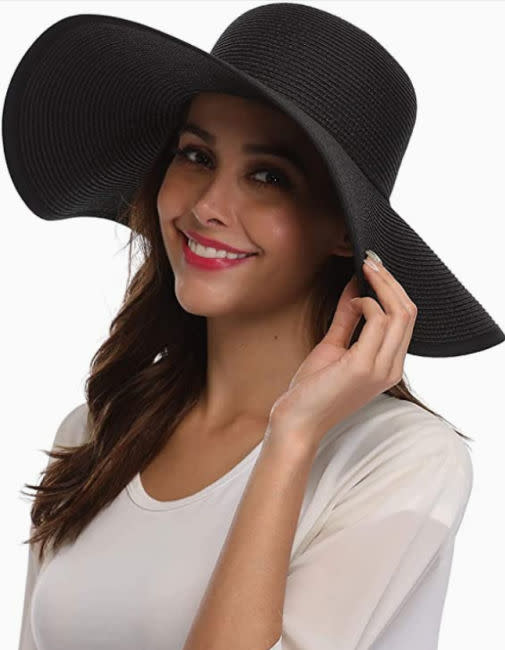 meghan markle black summer wide brim hat audrey hepburn