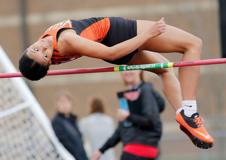 Ashland's Jaden Smith competes in the high jump during the Forest Pruner Track Invitational at Crestview High School on Friday, April 22, 2022. TOM E. PUSKAR/TIMES-GAZETTE.COM