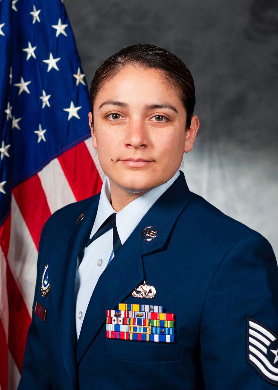 Tech Sgt. Amalya Velez's dress uniform reflects an exciting career that includes a combat tour in Afghanistan and rescue and relief operations in the Philippean Islands and Thailand.