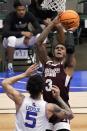 Louisiana Tech guard Kalob Ledoux (5) defends against a shot by Mississippi State guard D.J. Stewart Jr. (3) in the first half of an NCAA college basketball game in the semifinals of the NIT, Saturday, March 27, 2021, in Frisco, Texas. (AP Photo/Tony Gutierrez)