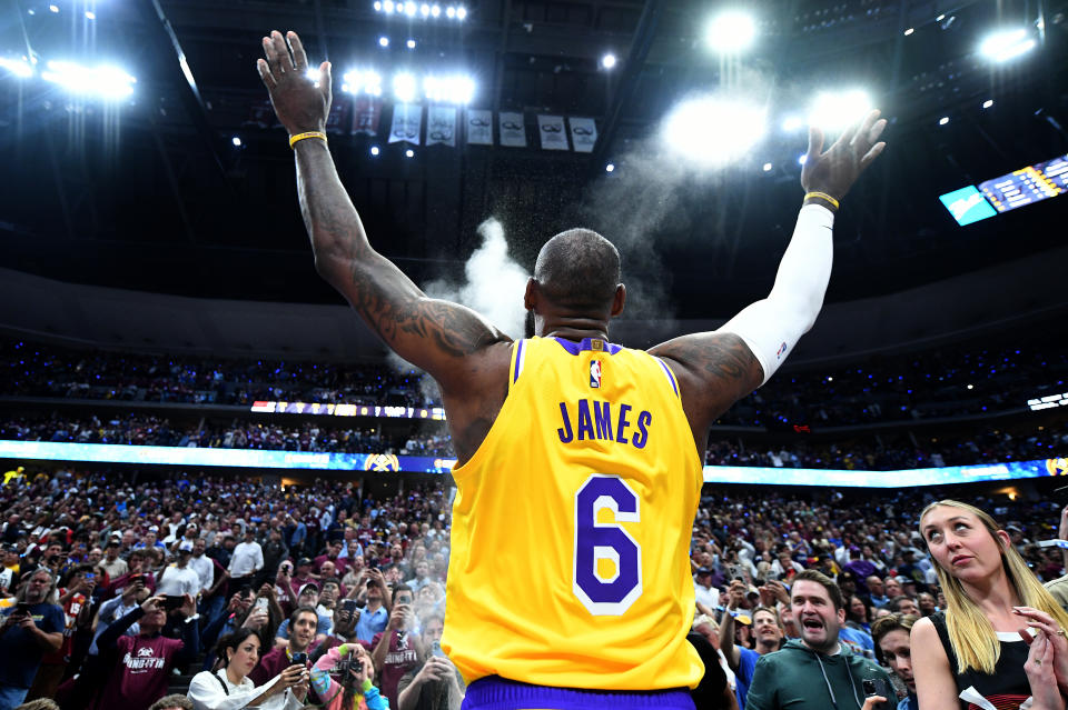 Denver, Colorado May 16, 2023-Lakers LeBron James tosses powder before Game 1 of the Western Conference Finals in Denver Tuesday. (Wally Skalij/Los Angeles Times via Getty Images)