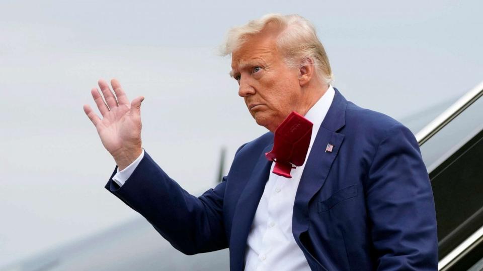 PHOTO: FILE - Former President Donald Trump waves as he steps off his plane at Ronald Reagan Washington National Airport, Aug. 3, 2023, in Arlington, Va. (Alex Brandon/AP, FILE)