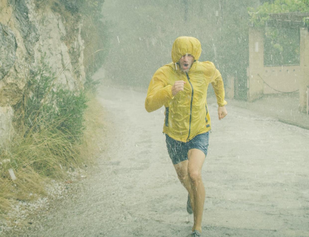 Neither rain, nor snow, nor sleet, nor hail shall keep a streaker from their self-appointed activity. <a href="https://www.gettyimages.com/detail/photo/athletic-man-jogging-in-extreme-weather-condition-royalty-free-image/1184153812" rel="nofollow noopener" target="_blank" data-ylk="slk:janiecbros/E+ via Getty Images;elm:context_link;itc:0;sec:content-canvas" class="link ">janiecbros/E+ via Getty Images</a>