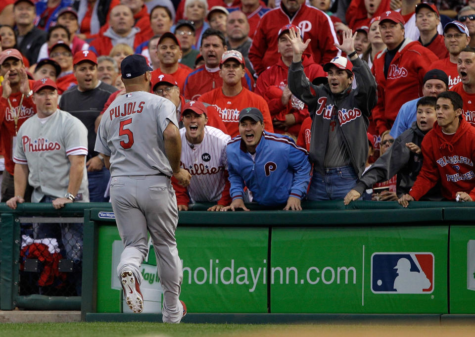 PHILADELPHIA, PA - OCTOBER 01: Fans react to Albert Pujols #5 of the St. Louis Cardinals catching a ball in foul territory during Game One of the National League Division Series against the Philadelphia Phillies at Citizens Bank Park on October 1, 2011 in Philadelphia, Pennsylvania. (Photo by Rob Carr/Getty Images)