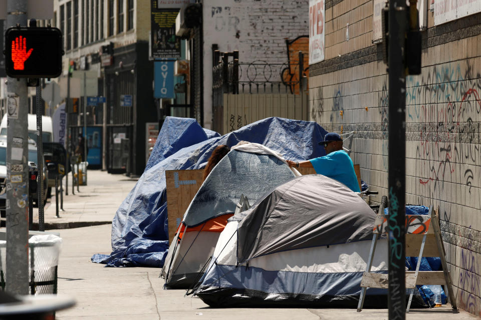 Tents and tarps erected by homeless people are shown along sidewalks and streets in the skid row area of downtown Los Angeles. (Photo: Patrick Fallon/Reuters)