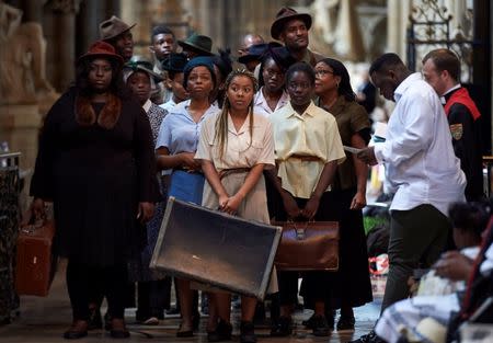 Performers from the HEbE Foundation charity perform during a Service of Thanksgiving to mark the 70th anniversary of the landing of the Windrush, at Westminster Abbey, London, Britain, June 22, 2018. Niklas Halle'n/Pool via REUTERS